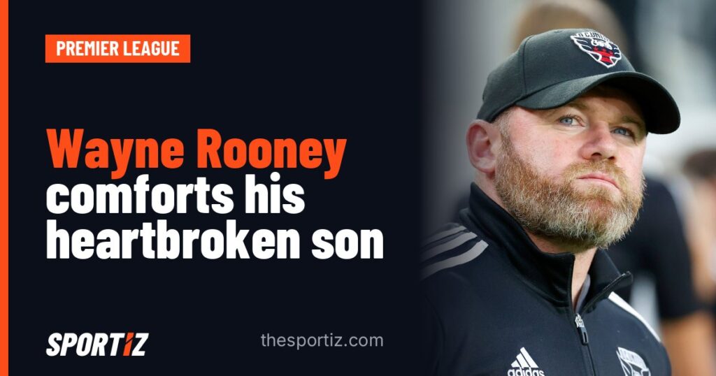 Wayne Rooney comforts his heartbroken son